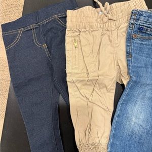 Pants and pink hoody.